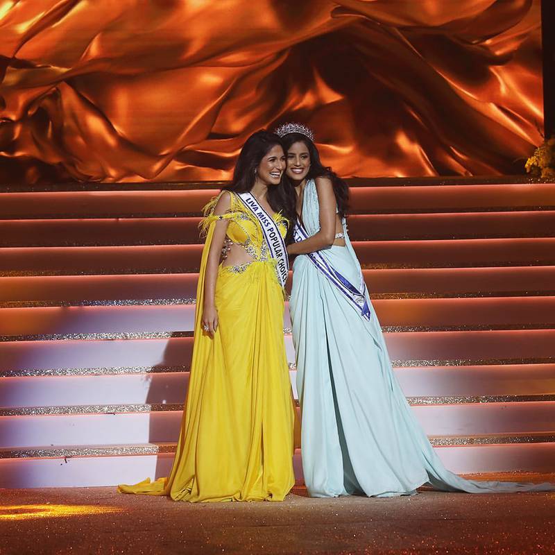Miss Popular Choice 2022 award winner Ojasvi Sharma, left, was chosen via audience votes. 