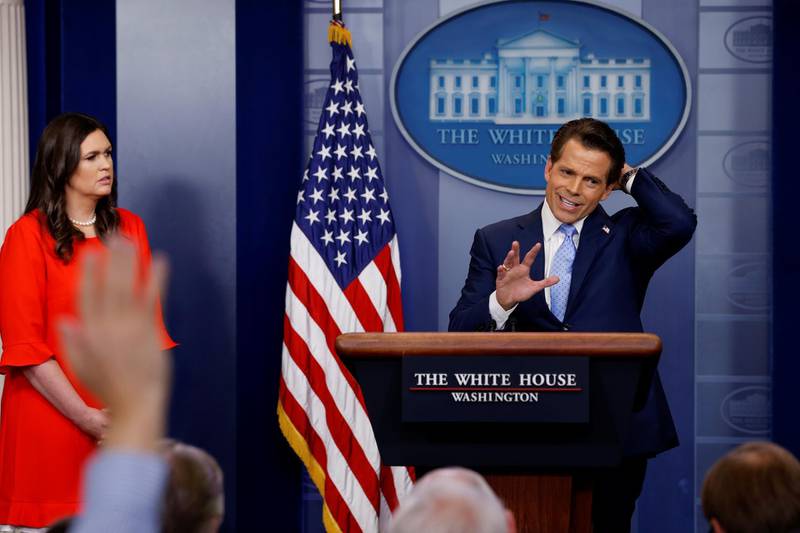 FILE PHOTO: White House Communications Director Anthony Scaramucci, flanked by White House Press Secretary Sarah Sanders, speaks at the daily briefing at the White House in Washington, U.S. July 21, 2017. REUTERS/Jonathan Ernst/File Photo
