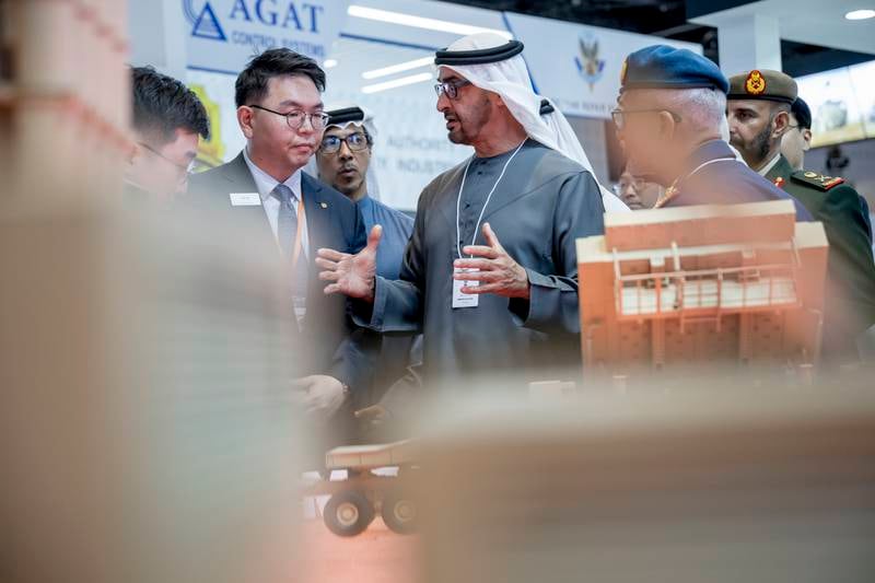 President Sheikh Mohamed visits a booth
