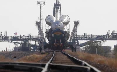 epa07863460 The Soyuz booster rocket FG with Soyuz MS-15 spacecraft is rolled out to the launch pad with a train at the Baikonur Cosmodrome, Kazakhstan, 23 September 2019. The launch of the mission of members of the International Space Station (ISS) expedition 61/62, UAE astronaut Hazza Al Mansouri, Roscosmos cosmonaut Oleg Skripochka and NASA astronaut Jessica Meir is scheduled on 25 September from the Baikonur Cosmodrome. Mansouri will be the first Emirati in space.  EPA/MAXIM SHIPENKOV