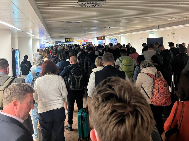 Passengers queue at Brussels Airport on Monday. Frustrated travellers said people were “skipping queues like crazy” as crowds waited in corridors after touching down. Photo: Twitter / @reveriesheeran