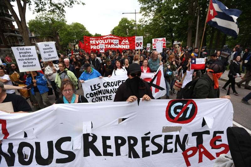 Anti-G7 protesters march during a demonstration in Quebec City. Lars Hagberg / AFP Photo