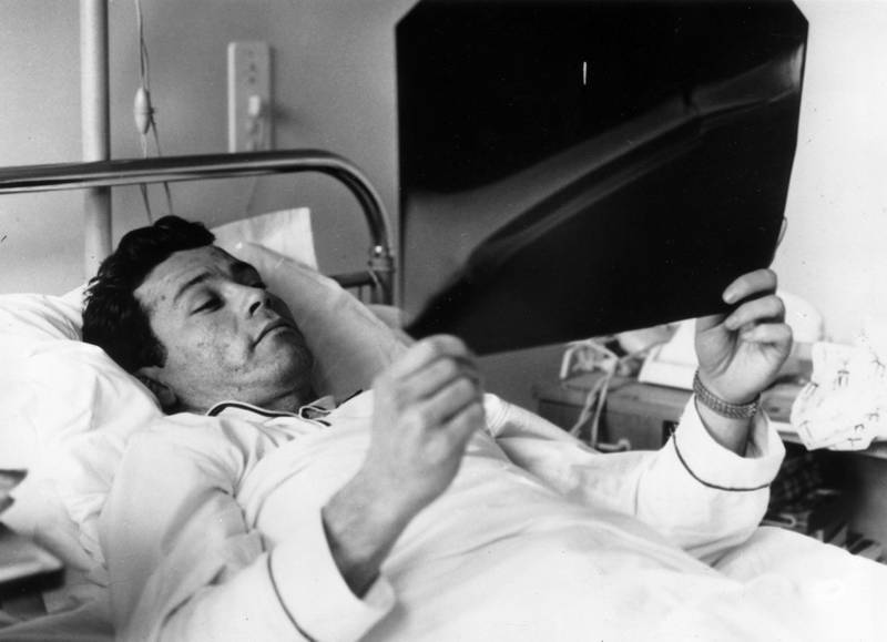 French striker Just Fontaine examines an X-Ray of his fracture in a clinic in Paris after he injured himself during the Reims-Limoges match in 1961. Getty