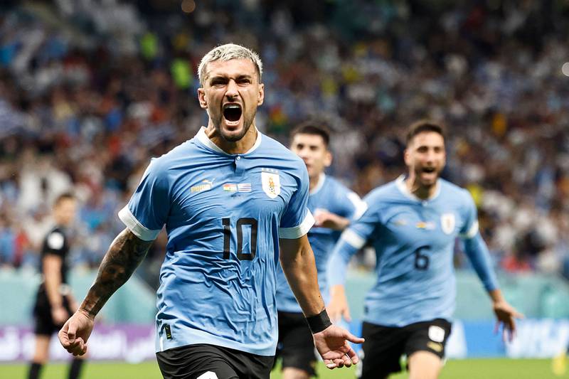 Uruguay's Giorgian de Arrascaeta celebrates scoring the opening goal against Ghana. AFP