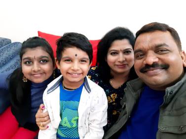 Shivamurthy Gali Krishnappa, right, with his wife and children. Courtesy: Mr Krishnappa 