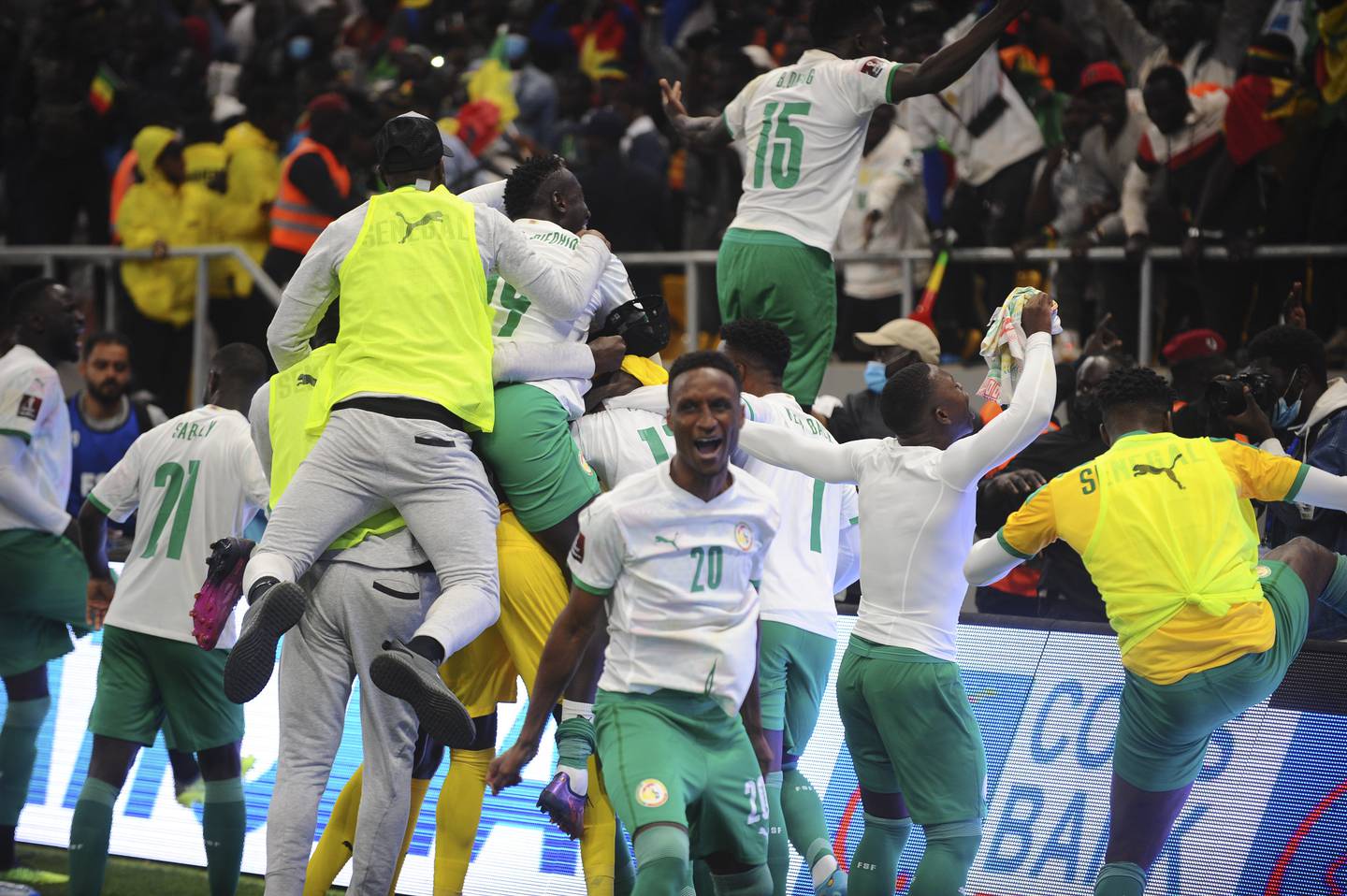 Senegal celebrate winning at the Diamniadio Olympic Stadium in Dakar, March 29, 2022. EPA