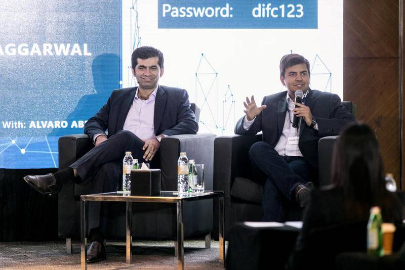 Mudassir Sheikha, cofounder and chief executive of Careem, left, with Bhavish Aggarwal, cofounder and chief executive of Ola Cabs, at Boostmena. Reem Mohammed / The National