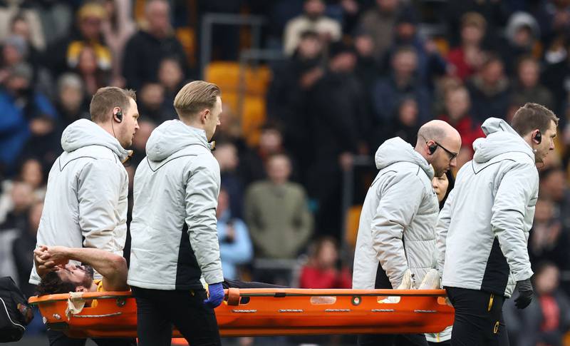 Wolves striker Diego Costa is is carried off the pitch after picking up a first-half injury. AFP