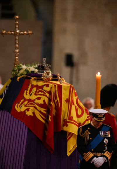 King Charles holds a vigil beside the coffin of his mother, Queen Elizabeth, as it lies in state on the catafalque in Westminster Hall. PA