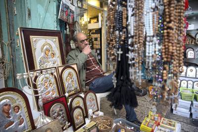 Shop owners wait for Christian pilgrims nearby the  Church of the Holy Sepulchre in the Old City of Jerusalem on Monday February 26,2018.The Church of the Holy Sepulchre  remained closed for a second day after church leaders in Jerusalem closed it to protest against Israeli's announced plans by the cityÕs municipality earlier this month to collect property tax (arnona) from church-owned properties on which there are no houses of worship.
(Photo by Heidi Levine for The National).