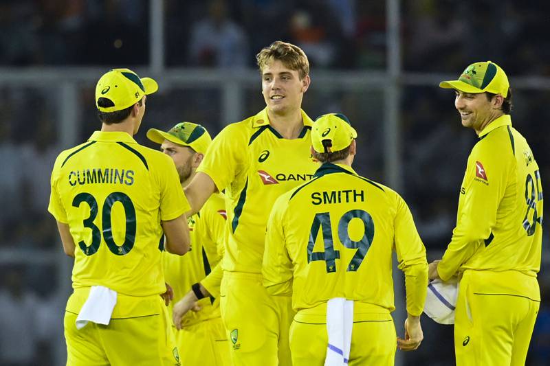 Australia's Cameron Green celebrates with teammates after dismissing India's Suryakumar Yadav. AFP
