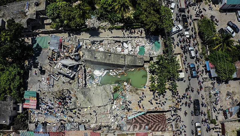 An aerial view of the Hotel Le Manguier destroyed by the earthquake. AP