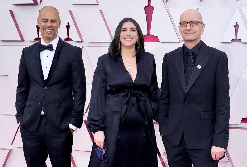 Jesse Collins, Stacey Sher, and Steven Soderbergh arrive to the 93rd Academy Awards, at Union Station, in Los Angeles, U.S., April 25, 2021. Chris Pizzello/Pool via REUTERS