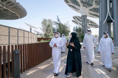 Marjan Faraidooni, Chief Experience Officer of Expo 2020 Dubai, briefed Sheikh Hamdan bin Mohammed on the event as they toured the Expo 2020 site. Courtesy, WAM