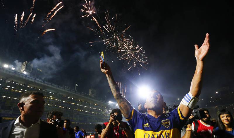 Carlos Tevez of Boca Juniors celebrates after winning the Argentinian Primera Division title at Alberto J. Armando Stadium in Buenos Aires on Saturday March 7. Getty