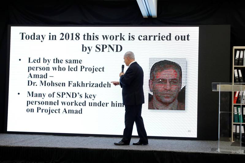 Israeli Prime Minister Benjamin Netanyahu points at a screen with an image of Iranian nuclear scientist Mohsen Fakhrizadeh during a news conference at the Defence Ministry of in Tel Aviv on April 30, 2018. Reuters