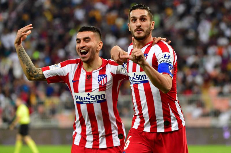 Atletico Madrid's Koke, right, celebrates after scoring the opening goal. AFP