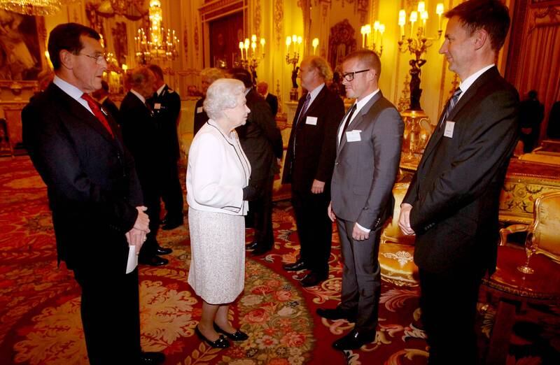 Celebrity chef Heston Blumenthal meets Queen Elizabeth at Buckingham Palace in 2012. Getty Images