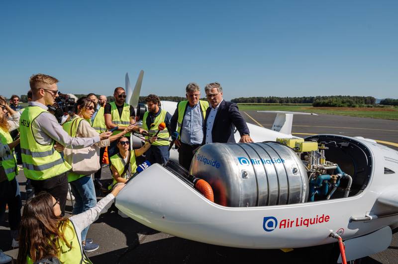 H2Fly's co-founder Josef Kallo shows the liquid hydrogen tank in the four-seater HY4 aircraft. Bloomberg 