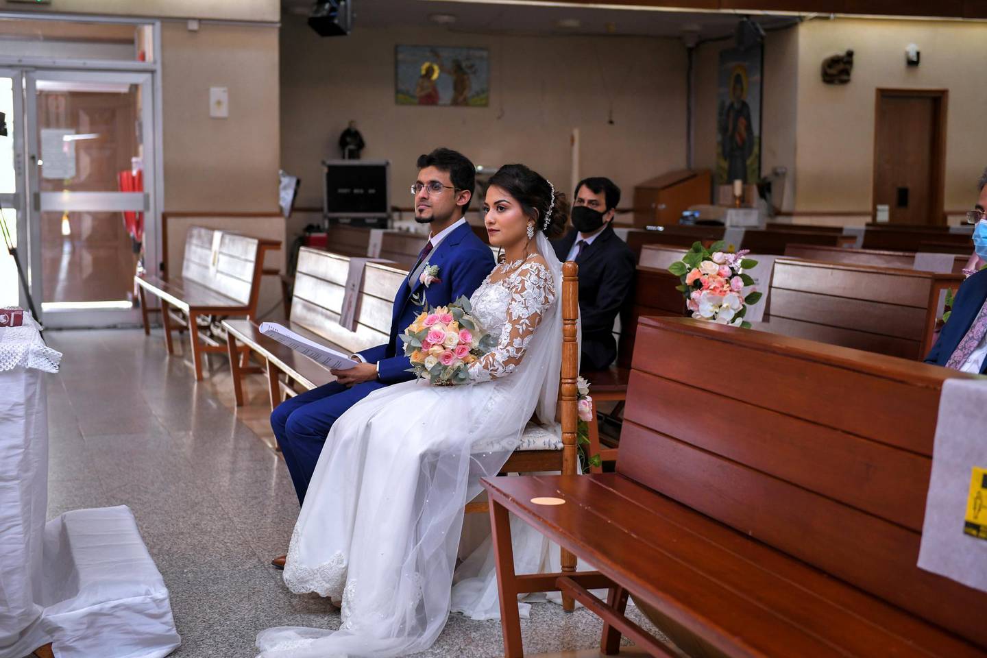 The couple didn't have a photographer and used a livestream set-up. Photo: Arun Pious with livestream by Jeevan Jose of Freehands Media House