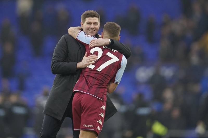 Aston Villa's manager Steven Gerrard hugs Lucas Digne after the win over Everton. AP