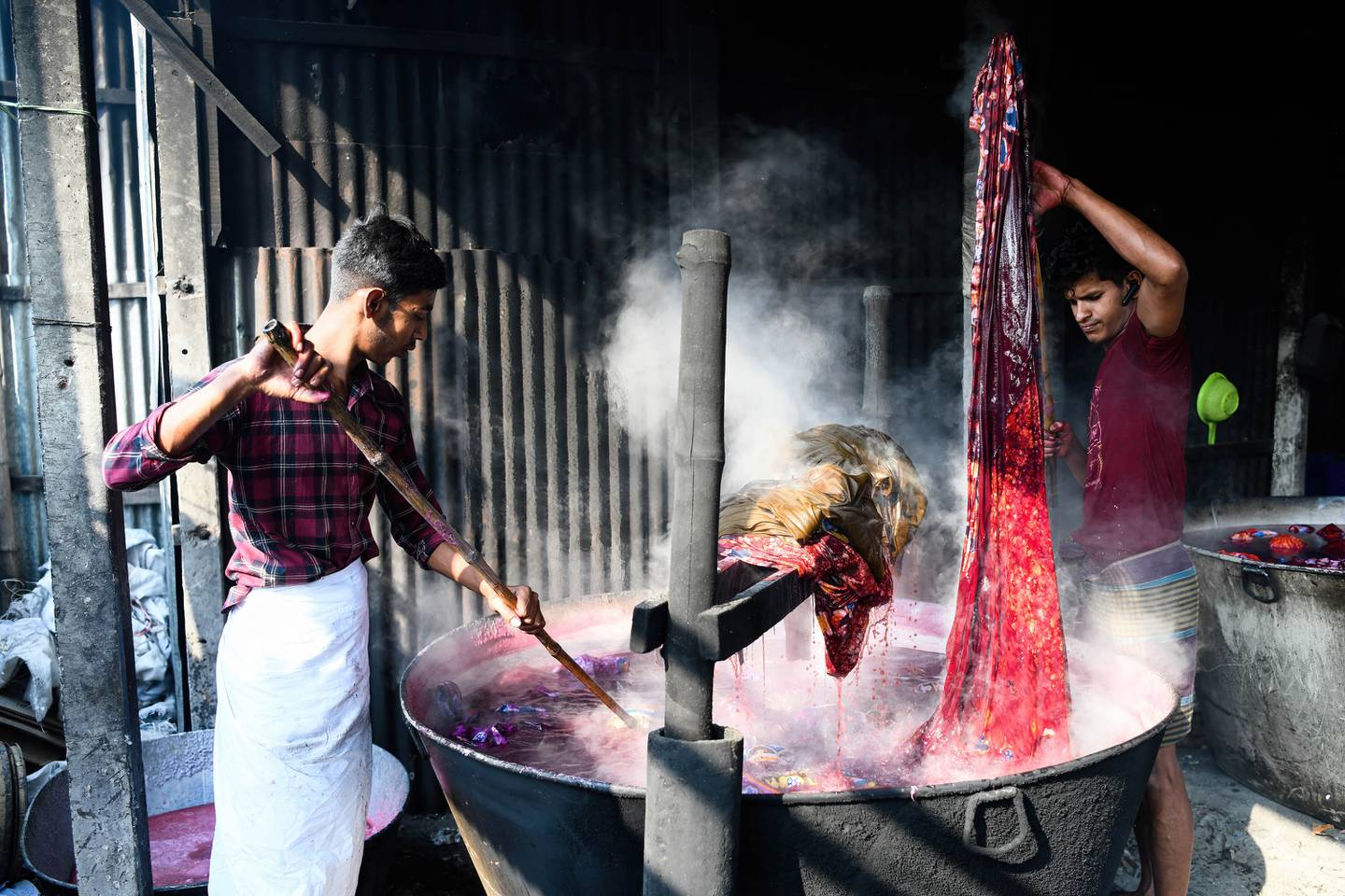 Workers at a dyeing factory in Bangladesh. SOPA Images/LightRocket via Getty Images