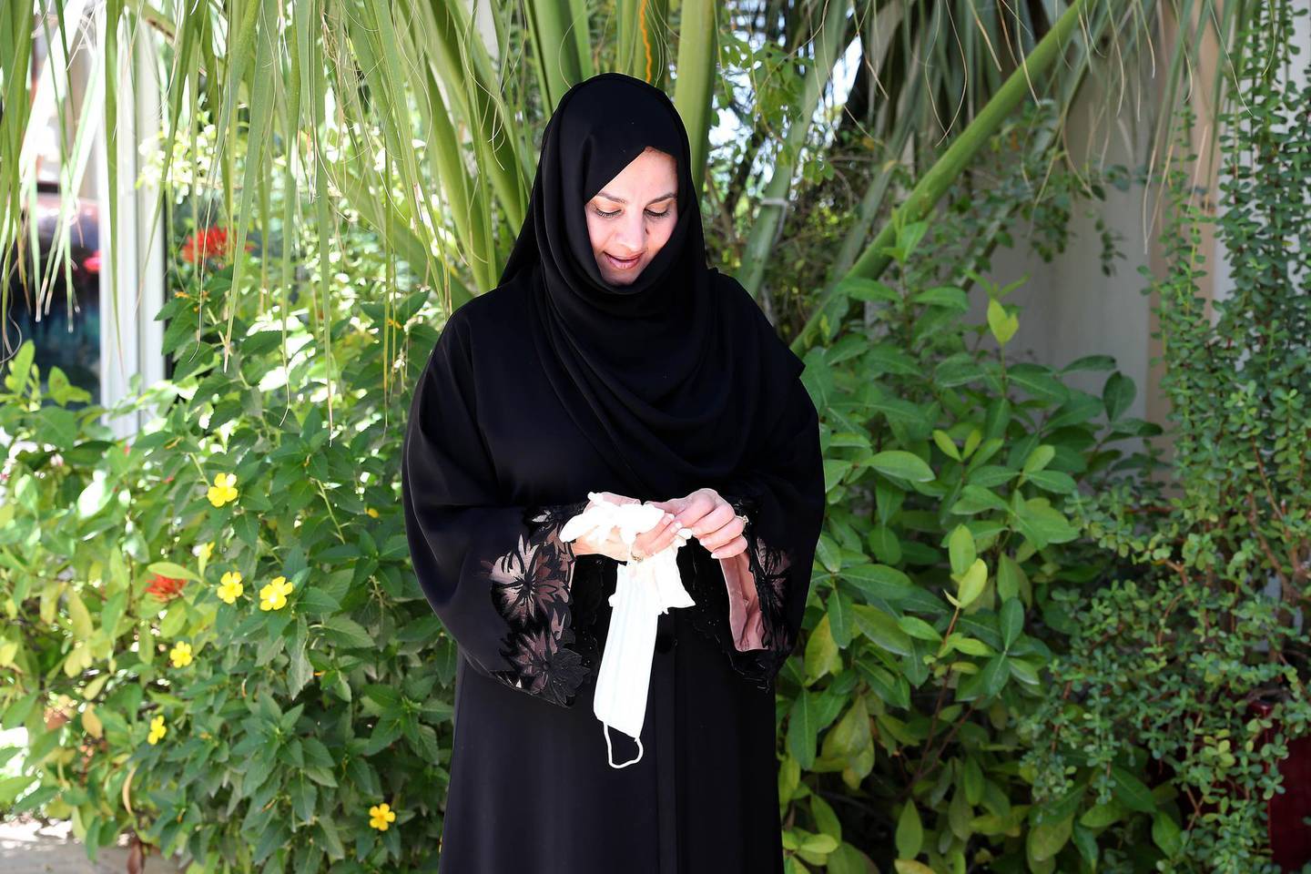 DUBAI, UNITED ARAB EMIRATES , May 12 – 2020 :- Habiba Al Marashi from Emirates Environmental group talking about the discarded masks and gloves which could become a health hazard as people dump them on the streets in Dubai. She is at her villa in Al Barsha 2 in Dubai. (Pawan Singh / The National) For News/Online. Story by Kelly