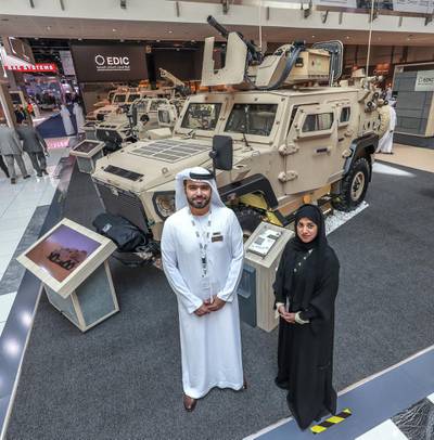 Abu Dhabi, U.A.E., February 20, 2019. INTERNATIONAL DEFENCE EXHIBITION AND CONFERENCE  2019 (IDEX) Day 4--  The Ajban 440 A Protected Vehicle and EDIC representatives at the show.  (L-R) Yaser Ahmed Al Hammadi and Mai Al Shebli.Victor Besa/The NationalSection:  NA