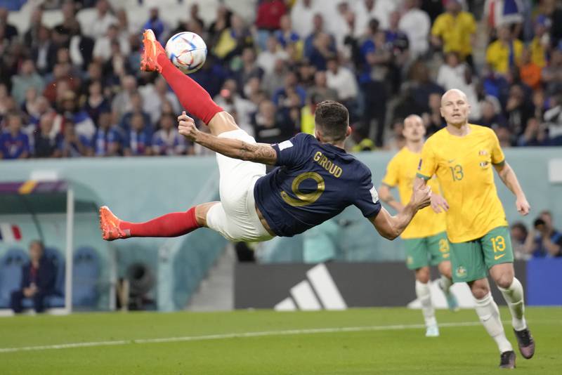 France's Olivier Giroud attempts to score with an overhead kick. AP 