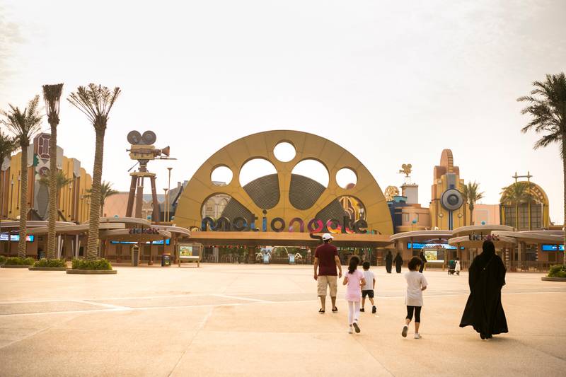 DUBAI, UNITED ARAB EMIRATES - JULY 18: A family walks towards Motiongate park's entrance.The National's reporter, Hala Khalaf, took her daughter, Alana, to the new Dreamworks Animation Zone at Motiongate, Dubai Parks & Resorts.(Photo by Reem Mohammed/The National)Reporter: Hala KhalafSection: AC