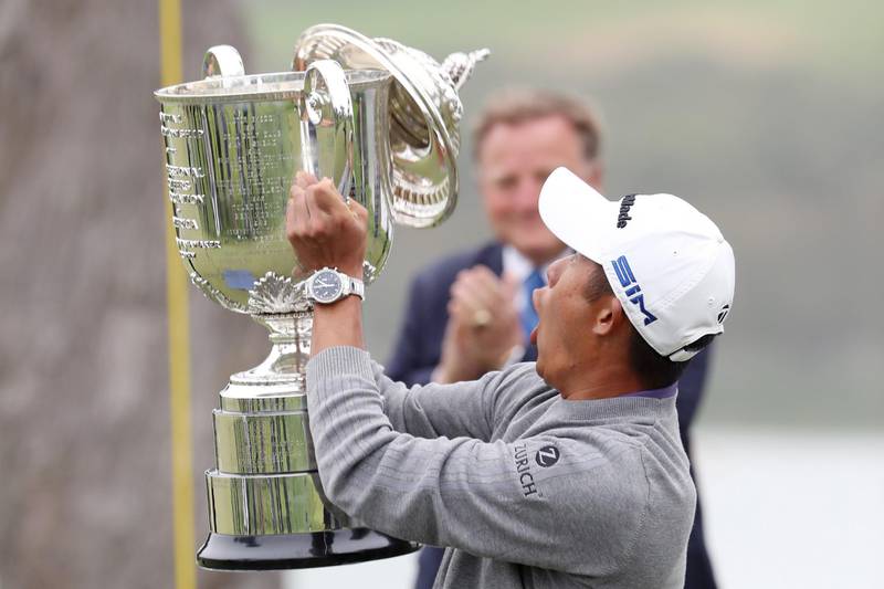 SAN FRANCISCO, CALIFORNIA - AUGUST 09: Collin Morikawa of the United States reacts as the lid to the Wanamaker Trophy falls off during the trophy presentation after the final round of the 2020 PGA Championship at TPC Harding Park on August 09, 2020 in San Francisco, California.   Jamie Squire/Getty Images/AFP
== FOR NEWSPAPERS, INTERNET, TELCOS & TELEVISION USE ONLY ==
