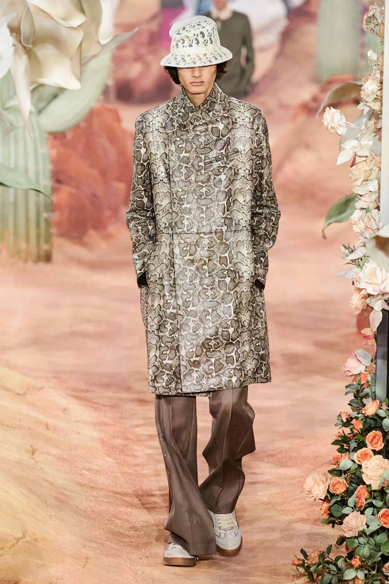 Hints of desert life informed the collection, such as the reworked snake print on this flap-fronted coat. Courtesy Dior