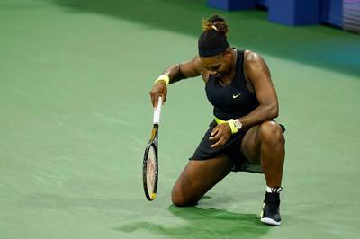 Serena Williams gets up from the court after a shot to Maria Sakkari, of Greece, during the third round at the Western & Southern Open tennis tournament Tuesday, Aug. 25, 2020, in New York. (AP Photo/Frank Franklin II)