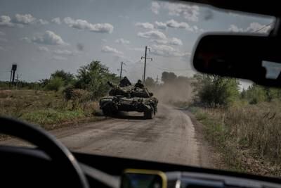 Ukrainian servicemen on a tank near the village of Robotyne, Zaporizhzhia region. Reuters