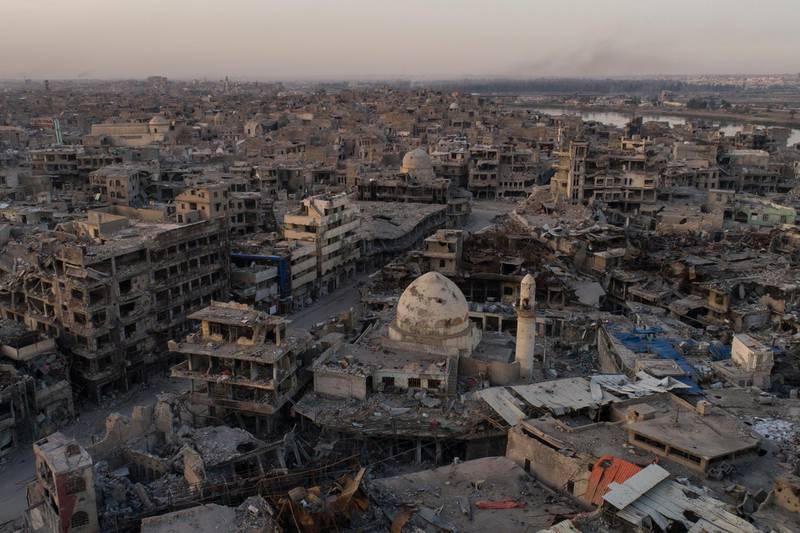 In this Nov. 15, 2017 photo, aerial view of destroyed building and shops in the Old City of Mosul, Iraq. The scope of destruction in the neighborhood is comparable to some of the worst urban battles of World War II, and the cost of rebuilding is nearly incalculable.  (AP Photo/Felipe Dana)