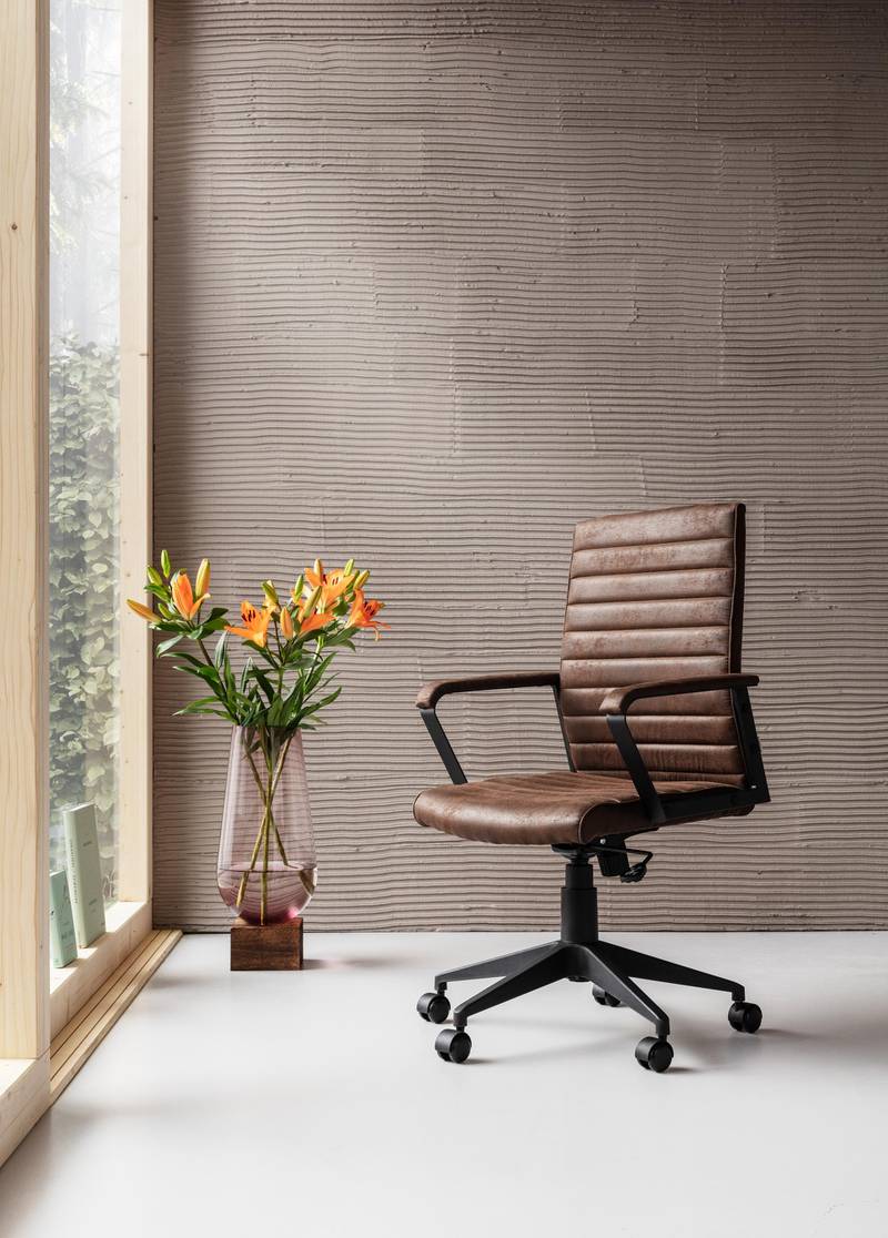 This swivel chair from Kare is enhanced with quilted leather detailing. A height-adjustable and rotatable frame is paired with an ergonomically shaped backrest and armrests. 
Labora office chair, Dh, 1,101, www.kareuae.ae