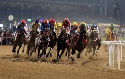 Runners compete in the Dubai World Cup at Meydan Racecourse. Chris Whiteoak / The National