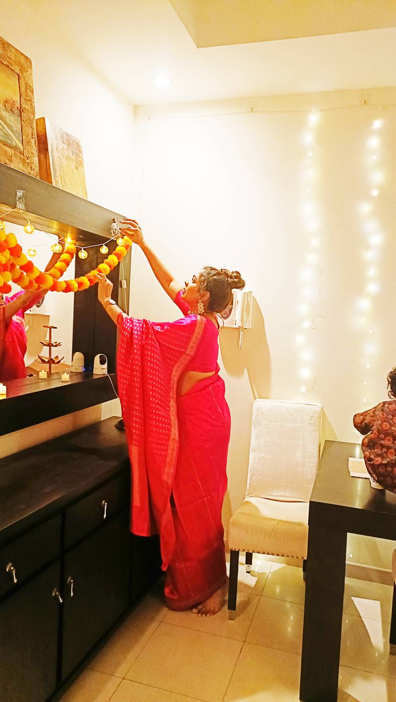Ms Gagwani adds the finishing touches to her decorations. Photo: Snehal Gagwani