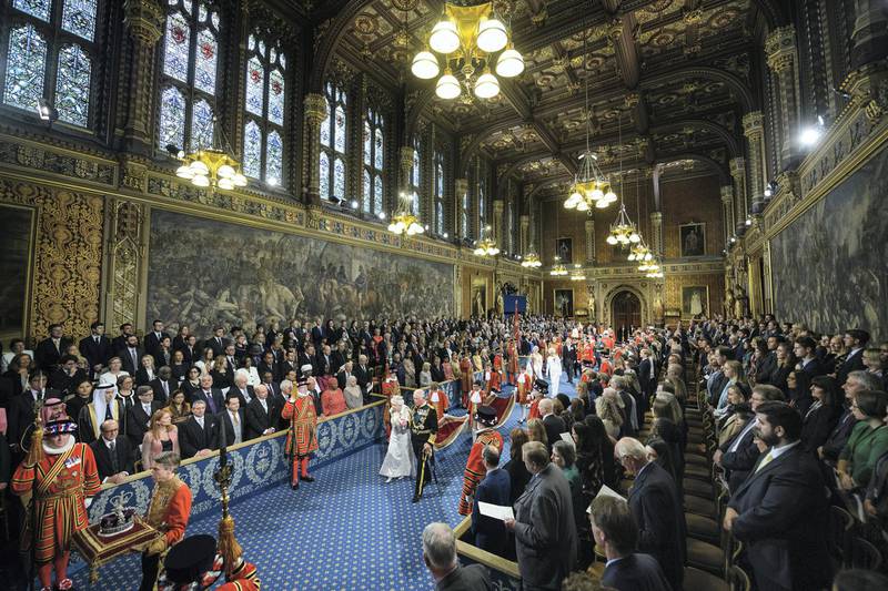 LONDON, ENGLAND - OCTOBER 14: Queen Elizabeth II and Prince Charles, Prince of Wales proceed through the Royal Gallery before the Queen's speech during the State Opening of Parliament at the Palace of Westminster on October 14, 2019 in London, England. The Queen's speech is expected to announce plans to end the free movement of EU citizens to the UK after Brexit, new laws on crime, health and the environment. (Photo by Leon Neal - WPA Pool/Getty Images)