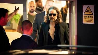 Russell Brand leaves the Troubadour Wembley Park theatre in north-west London after performing a comedy set on Saturday. PA