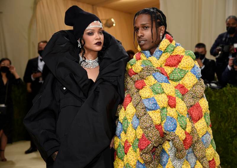 Rihanna, in Balenciaga and Bulgari diamonds, and A$AP Rocky attend the 2021 Met Gala. AP