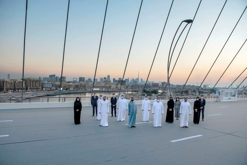 Sheikh Mohammed with officials on Infinity Bridge.