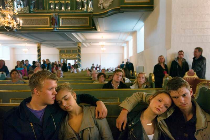 Friends and loved ones gather at Oslo Cathedral to mourn the victims, in July 2011.