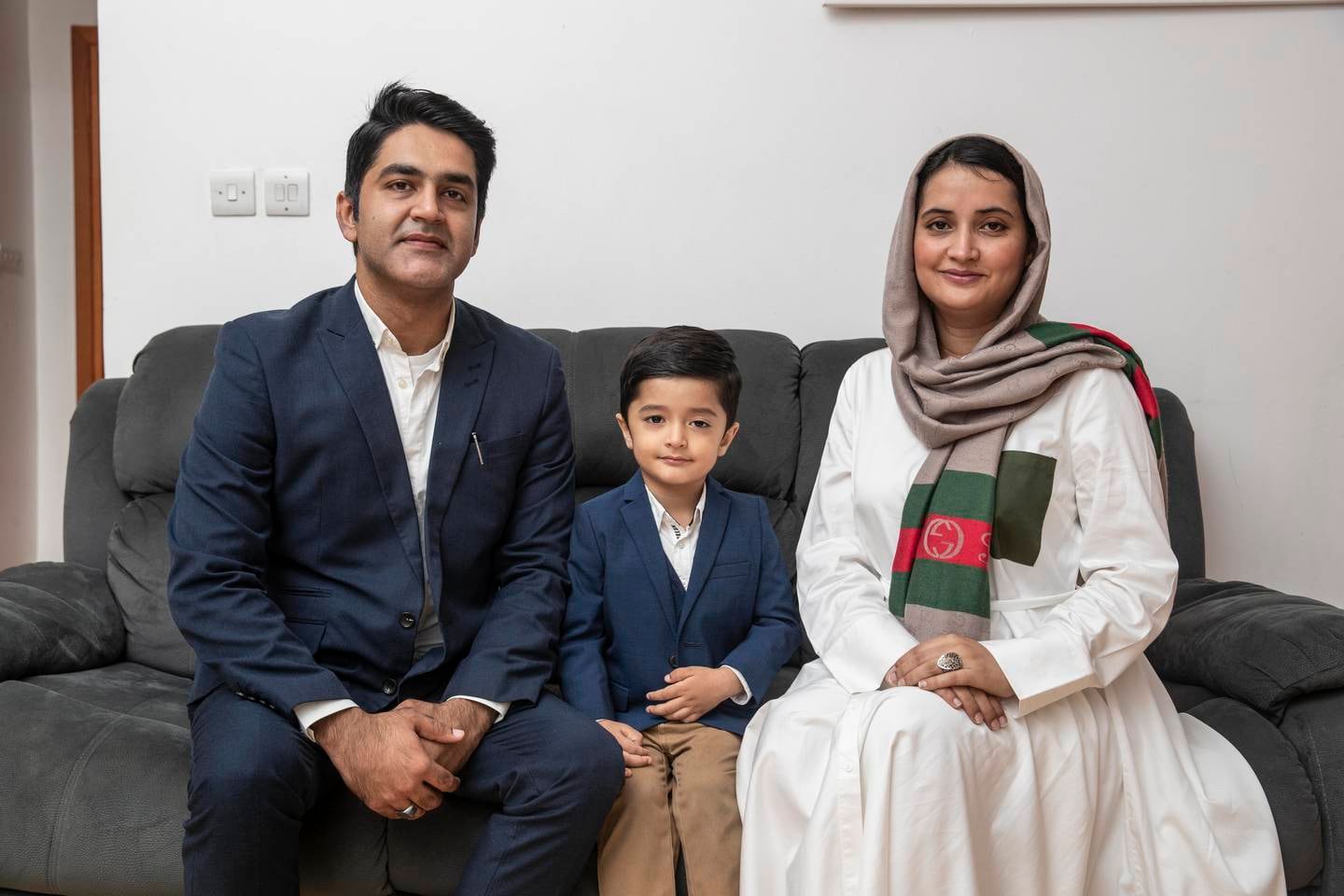 Dr Javairia Hassan with her husband and son. Photo: Antonie Robertson / The National 


