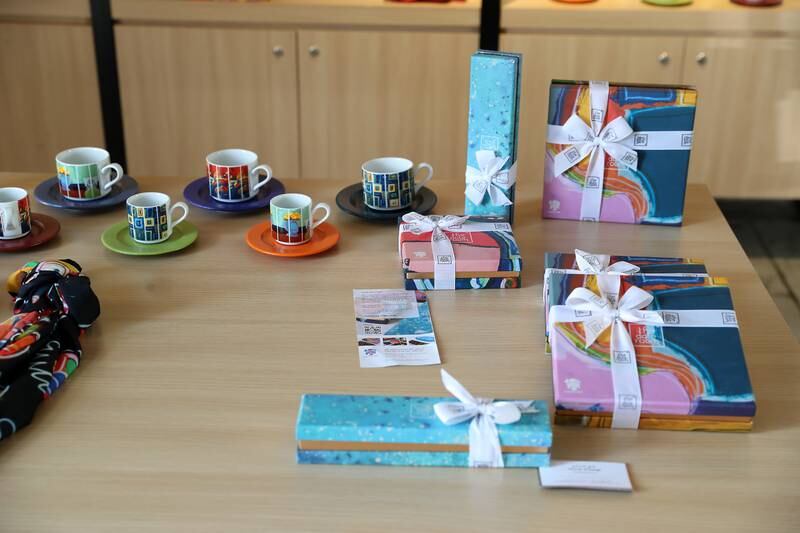 Gift boxes with special art motifs on display in the cafe at the studio. Pawan Singh / The National