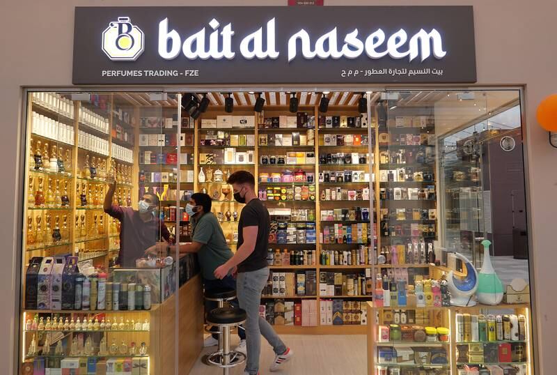 A perfume shop welcomes visitors at the Souk Al Marfa.