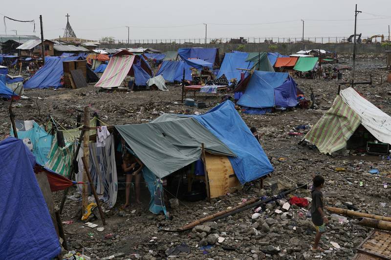 Thousands of people will see in 2022 from makeshift shelters after their homes were destroyed by the storm on December 16. AP