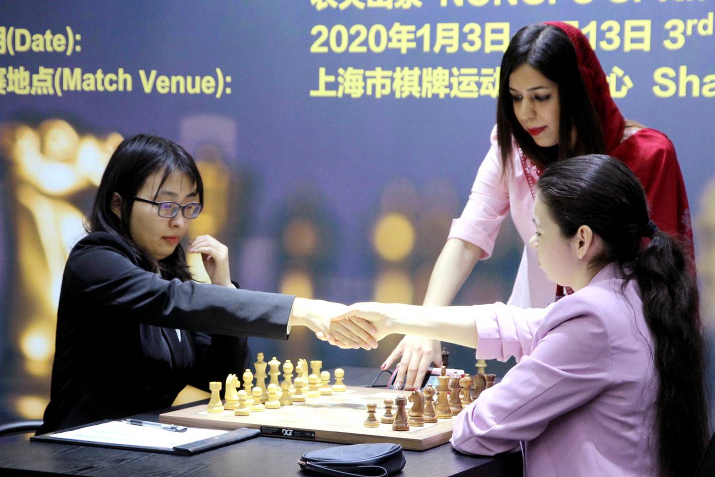 Hijab-wearing Iranian chess referee Shohreh Bayat looks on in this photo retrieved from social media during the Women's World Chess Championships in Shanghai, China, January 6, 2020.  Lewis Liu/FIDE/via Reuters This image was provided by a third party. Required credit. Resale prohibited. No archive.