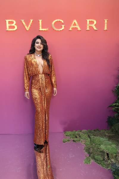 Priyanka Chopra, in an orange sequin dress by Rasario,  attends the Bulgari Eden the Garden Of Wonders event in Paris on June 6, 2022. Getty Images
