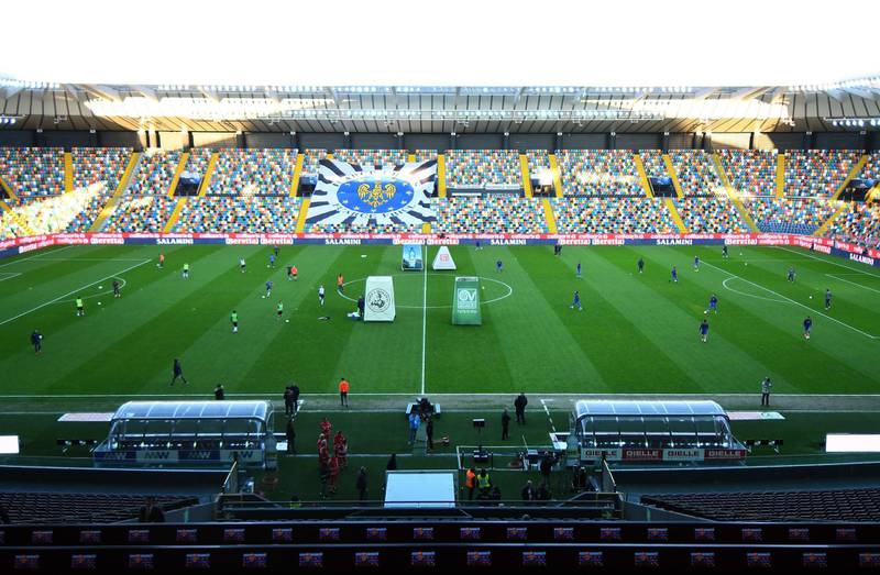 Udinese and Fiorentina players warm-up in an empty Stadio Friuli ahead of their Serie A game. Getty